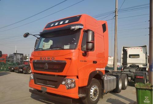 中国重汽豪沃t7h牵引车460马力重82吨拉砂石料赚吗