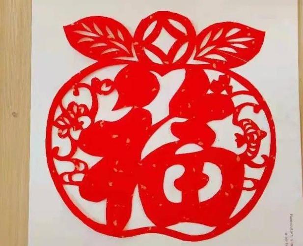 大汶口镇"剪纸迎新春 共筑中国梦"主题活动走进兴华街