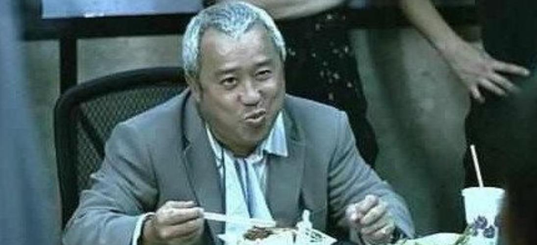 上图为曾志伟拍摄电影《无间道》时的精彩照片.