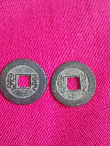 请问这两枚道光通宝哪个值钱