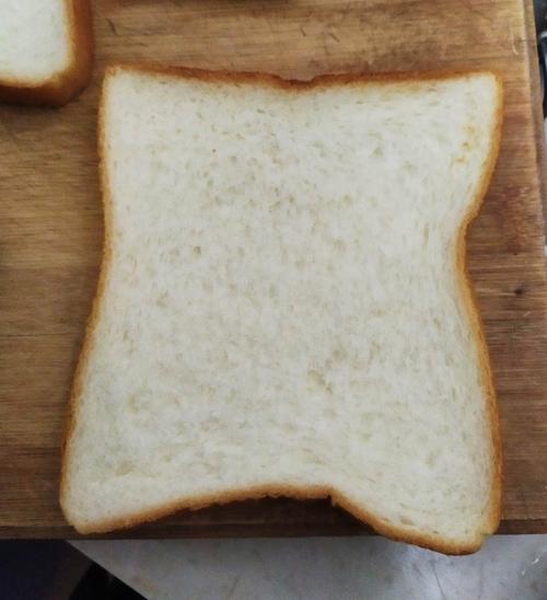 then,put   piece of bread at the bottom.
