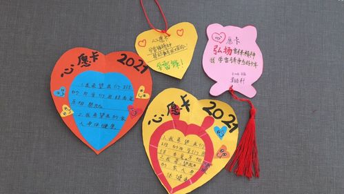 心愿挂满枝头,爱心溢满校园——记洛舍镇中心学校"小小心愿卡"活动