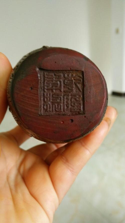 请问这个百子祝寿瓶是真品吗?