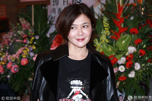 55岁关之琳短发清爽露小尖脸 眼神灵动