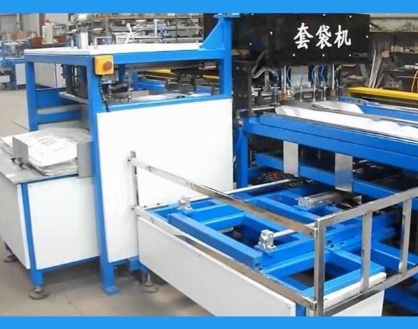 自动套袋机【价格 批发 厂家】-临沂亚鑫智能设备有限