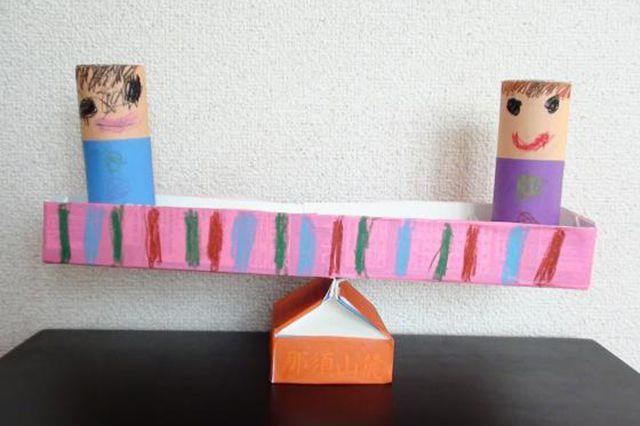 牛奶盒废物利用手工制作跷跷板玩具步骤图解