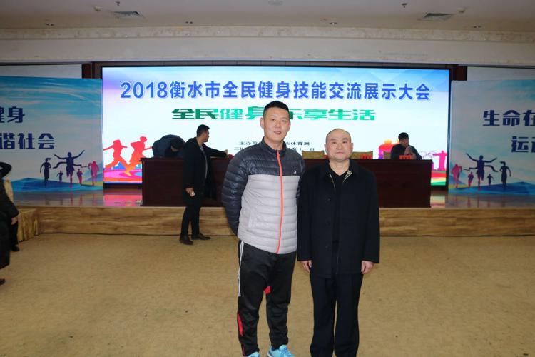 校长与李文军合影