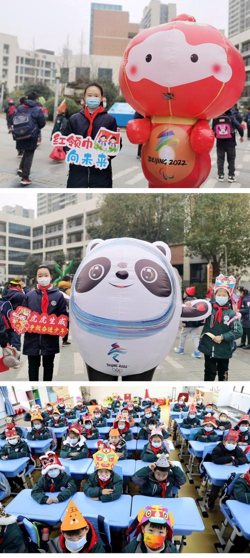 2月16日早晨,在合肥市翡翠学校校门口,由两位校长装扮的"冰墩墩"和"雪