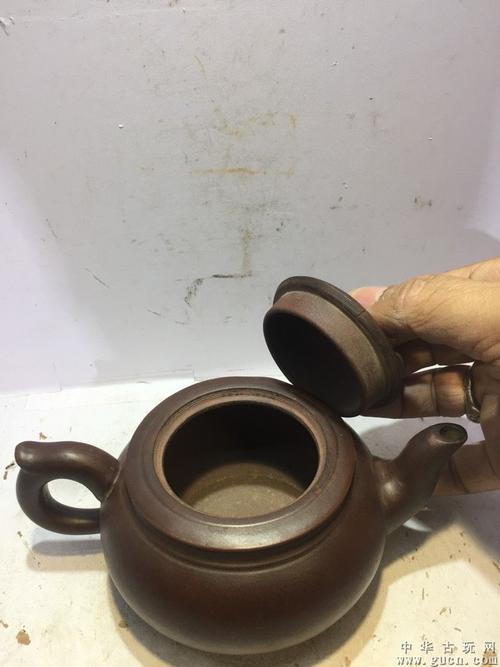 早期收藏周成易海纳百川紫砂提壸