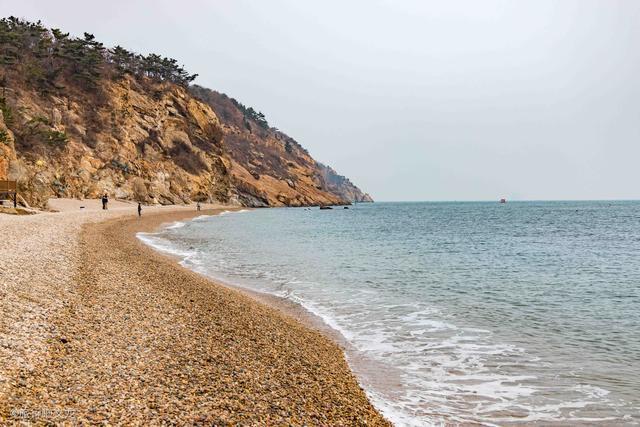 大连是北方明珠著名的沿海旅游城市棒槌岛是一个标志性景点
