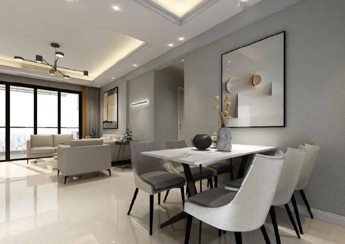 客厅以高级灰的艺术涂料墙面为主,搭配精致的家具,简约的设计往往能