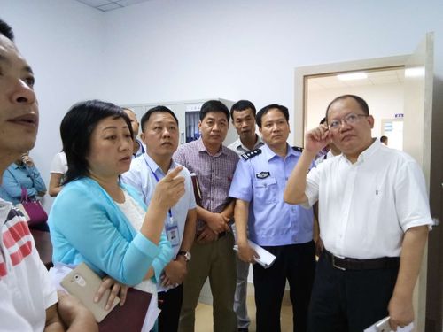 市委副书记周廉芬同志,市司法局金韬局长,市公安局副局长周有武同志与