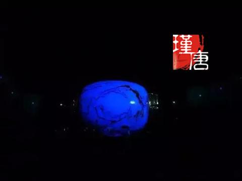 紫光灯下的注胶绿松石