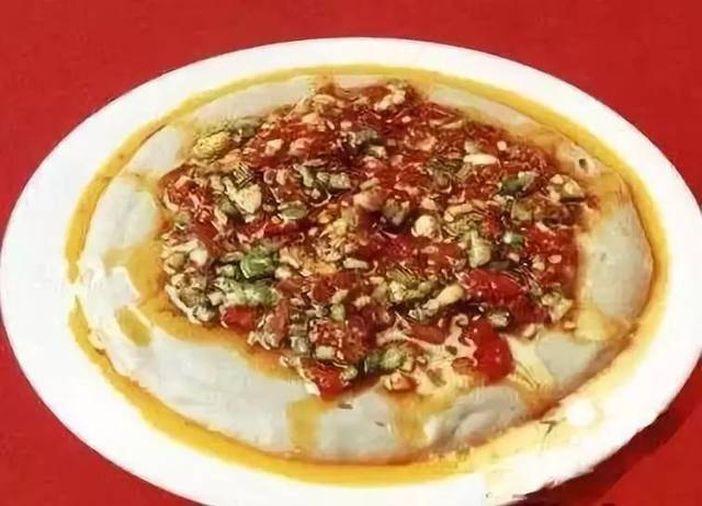 蘸糊糊是平遥人的一种粗粮吃法,主要由高粱面做成. 09 寿阳豆腐干