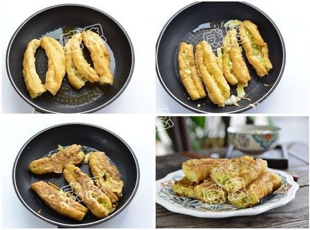 两面翻着煎,至鸡蛋成熟即可关火.6.用筷子拨开油条,灌入鸡蛋液.5.
