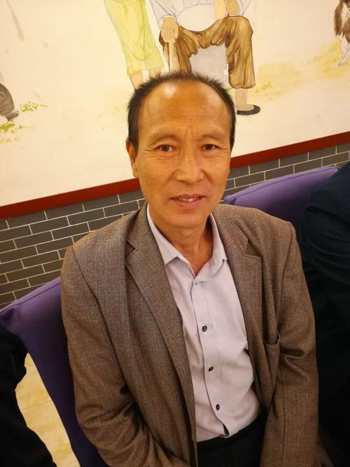 梁德明
