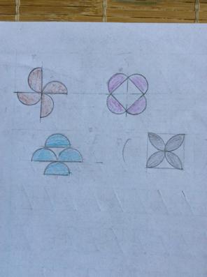 用4个半圆能组成哪3个不同的图案