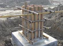 台阶式基础施工,可按台阶分层一次浇筑完毕(预制柱的高杯口基础的高台