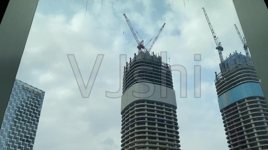 工地施工塔吊建筑工人城市建设吊机高楼