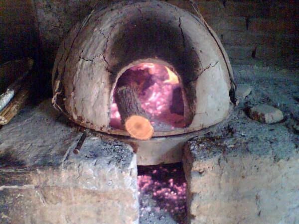 呵呵   开始了   上面吊炉里是大火,烧的热灰就铲到下面的炉子里