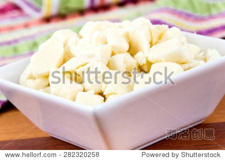 white dairy cheese curd in a bowl on table