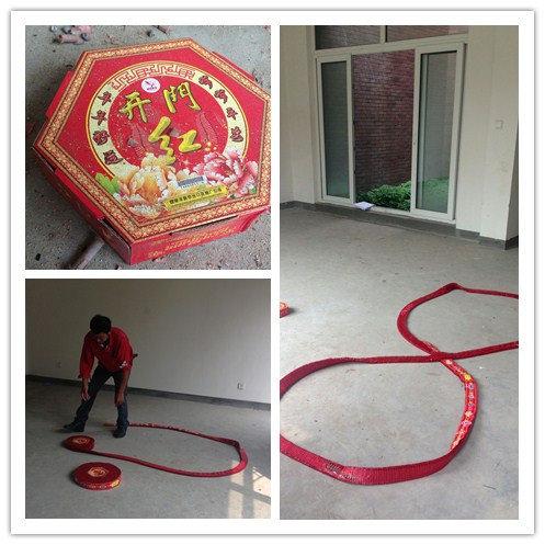 周师傅带来了两大卷鞭炮,帮我们摆好以后,让lg来点~(在他们的引导下
