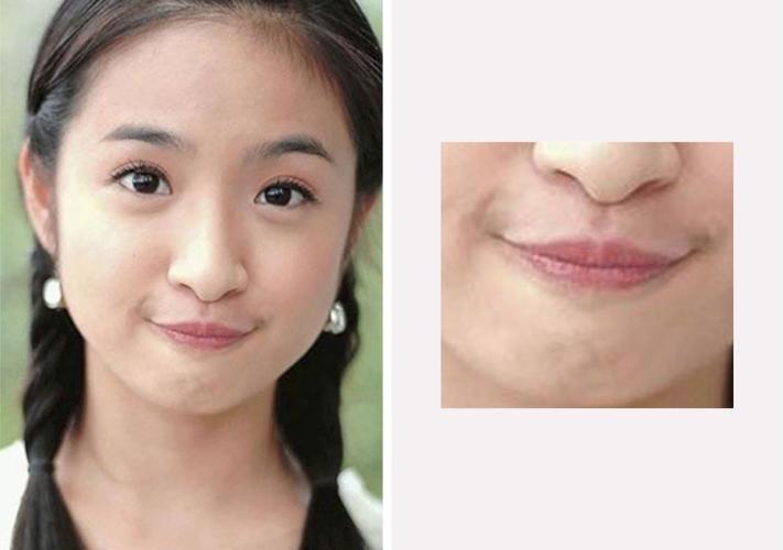 但是放大剧照就会发现她唇边有一点点小唇毛.