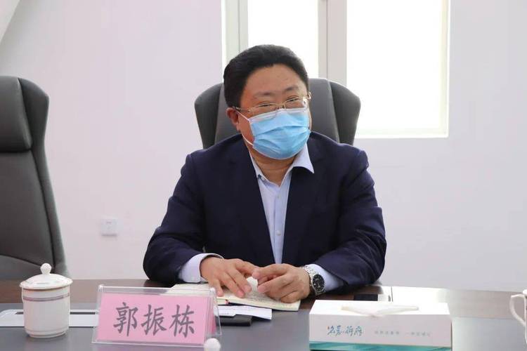 青岛市民营经济发展局局长郭振栋一行到文达通股份督导