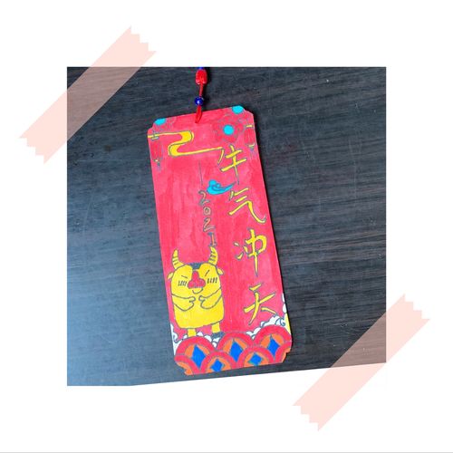 我还设计了一款书签,不错吧牛年主题——牛气冲天!