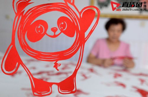 河北邯郸:剪纸艺人创作"冬奥会运动项目全家福" 助威冬奥会