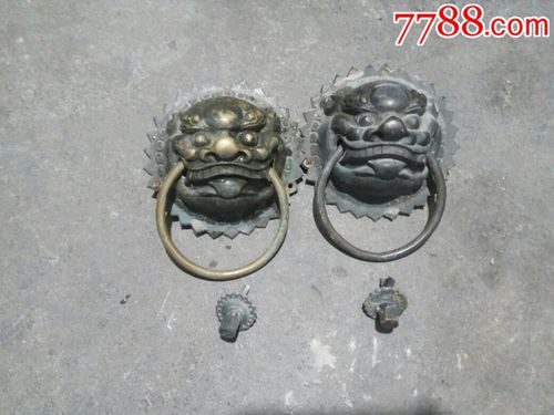 铜狮子门环一对