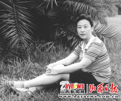 阳曲县委常委,副县长,统战部长何爱萍.