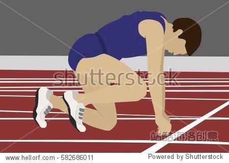 athlete on the starting blocks. running man on low start.