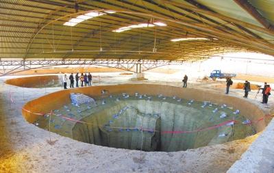 隋国家粮仓回洛仓:仓城50个足球场大 有仓窖700座