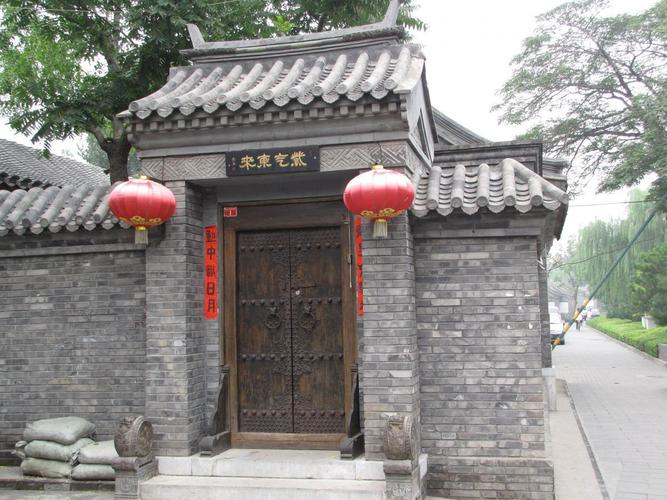 四合院木雕花型木门_中式花格木门_成都仿古大门生产厂家