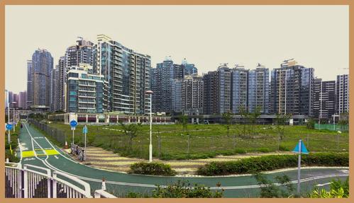 将军澳海滨,几年前这里的高楼还在建设中,如今已经基本建成,一个