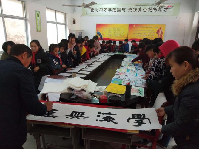 "弘扬传统文化,书写美丽人生"三义寨小学书法艺术活动