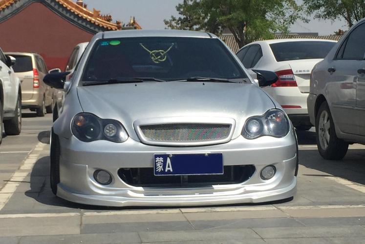 国产车也有高颜值,吉利自由舰改装后展示低姿态魅力!