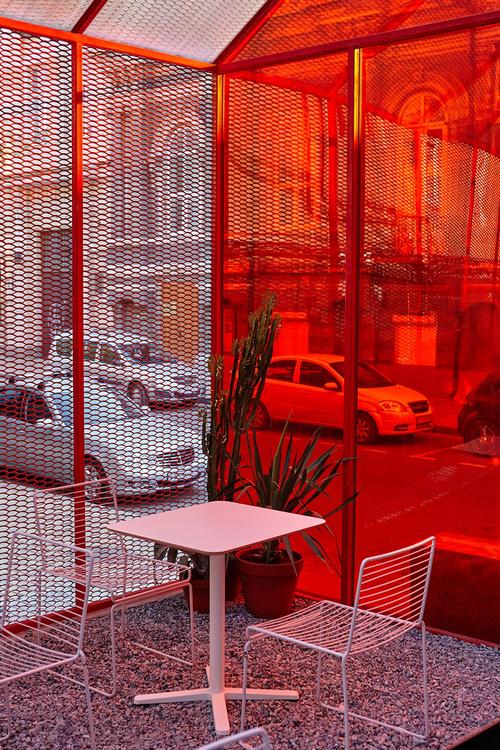 unique light and shadow effects caused by the red plexiglass