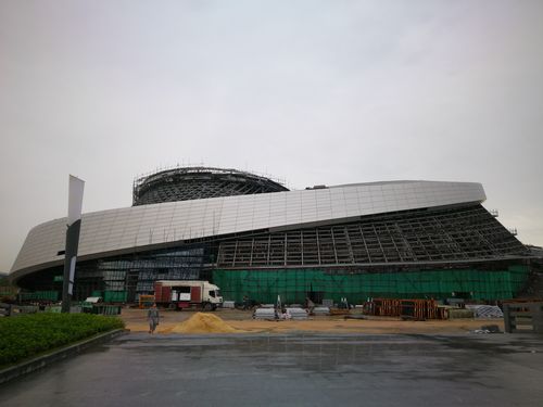江门滨江体育中心幕墙工程竣工在即业明华幕墙酷夏抢工