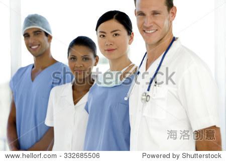 multi ethnic doctors and nurse standing in a row