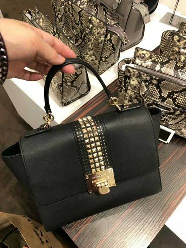 mk十字纹牛皮包
