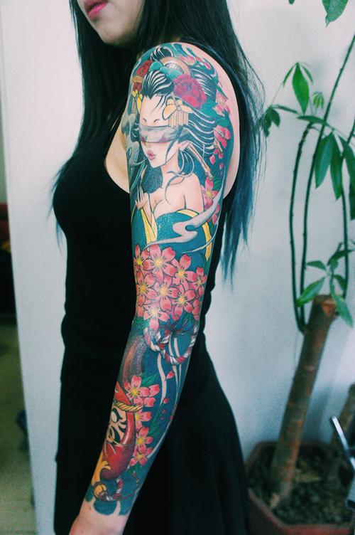 老徐的纹身作品有艺妓的日式花臂