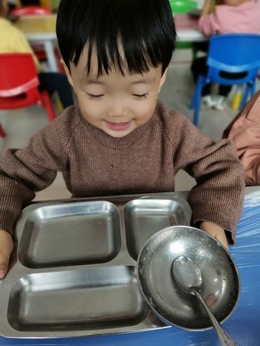 "光盘行动,从我做起"——启明小学附属幼儿园光盘行动主题活动(副本)