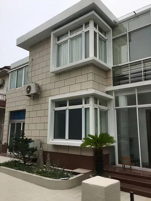 农村怪象为何现在的自建房外墙不再贴瓷砖而是选择喷真石漆