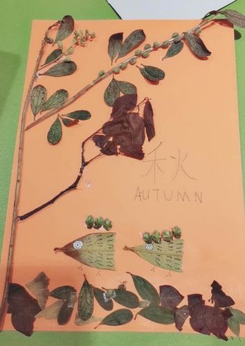 "迎中秋,庆国庆"树叶贴画