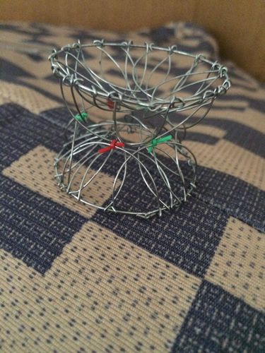 这个小玩具叫什么 细铁丝做的 可以变成花朵,花篮等形状