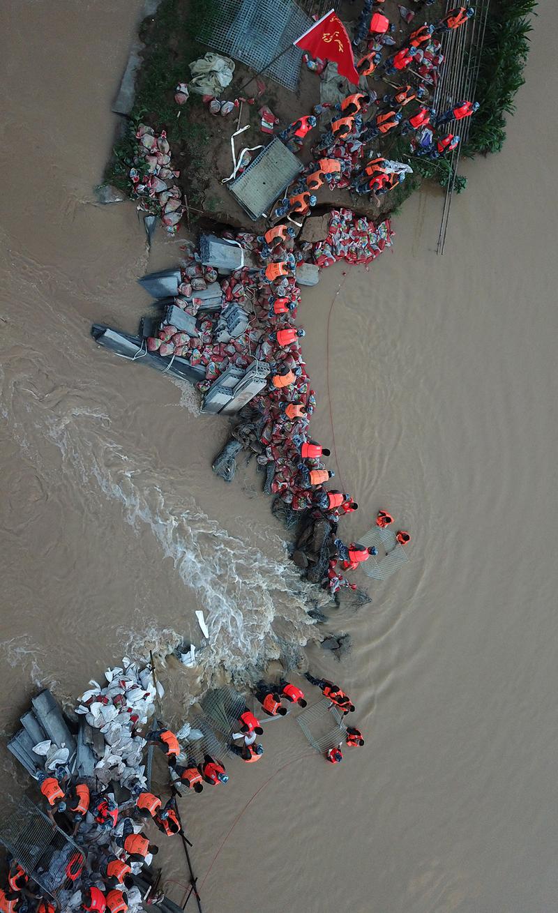 台风,洪水中的每一位"平民英雄"