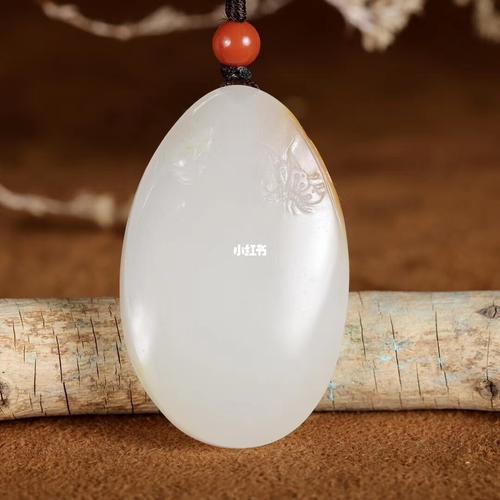 新疆和田玉羊脂白玉籽料-观音_和田玉_玉器_和田玉籽料_珠宝_时尚