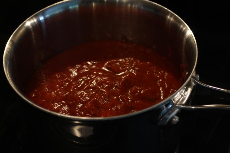 in a 3qt saucepan, combine the crushed tomatoes and spaghetti